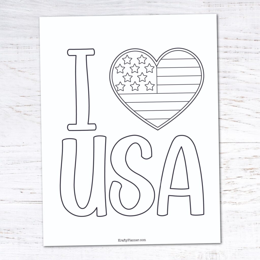 Coloring page with 'I Love USA' text and heart featuring the American flag
