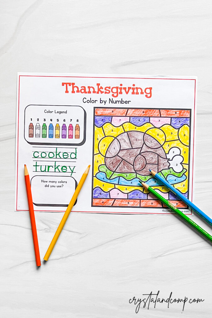 Thanksgiving Preschool Color By Number Printables Thanksgiving color by number printable featuring a cooked turkey and colorful crayons